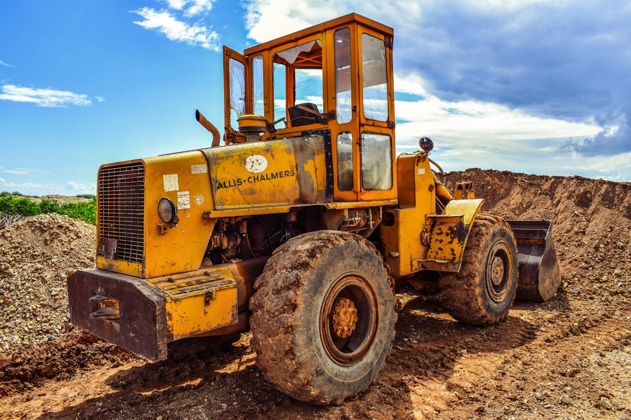 menu-02 A yellow bulldozer on a construction site, highlighting heavy machinery in action.